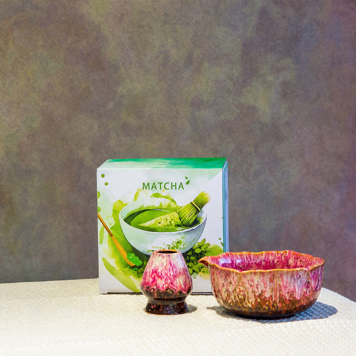 Two-piece matcha set in a crimson kiln glaze with its Matcha-printed gift box