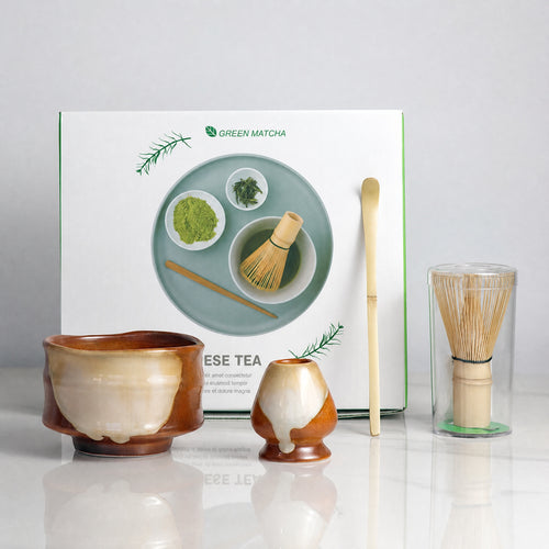 Ivory ceramic matcha tea ceremony set arranged with its gift box