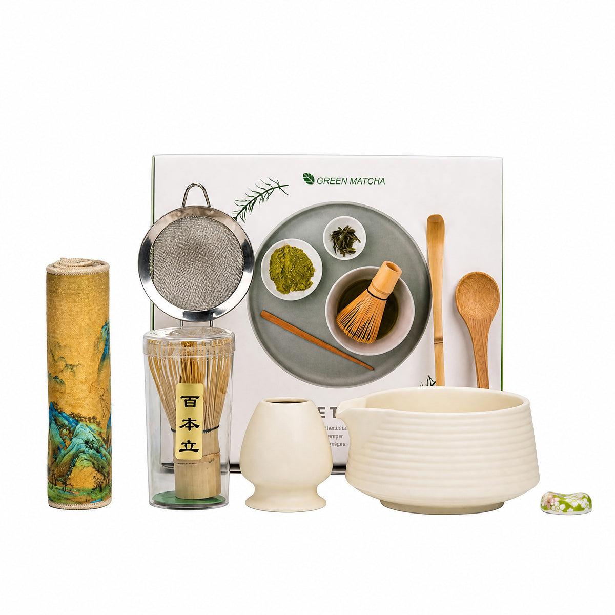 Eight-piece matcha tea set on a white background: bowl, bamboo whisk, whisk stand and tools