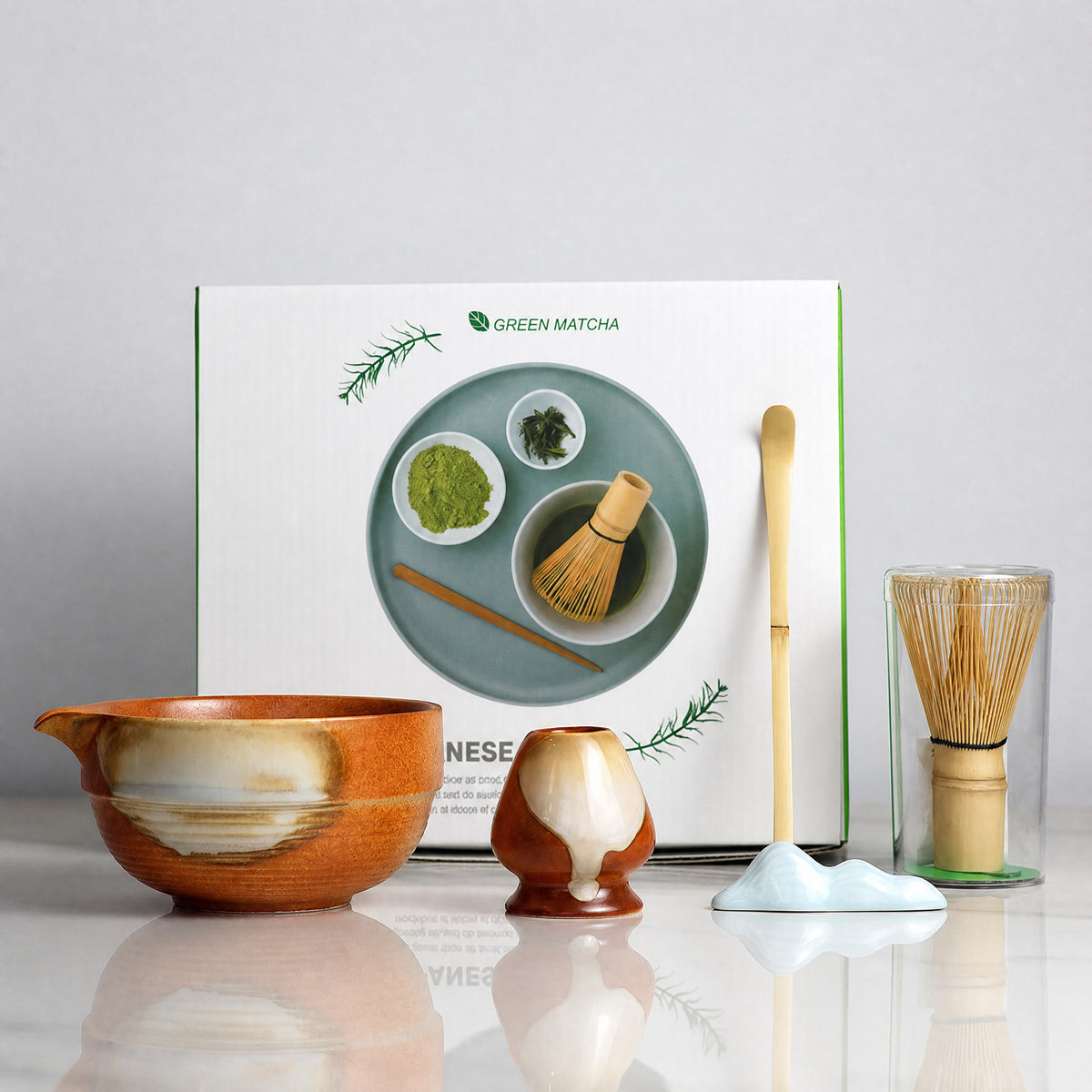 Amber kiln-glaze ceramic matcha bowl and bamboo whisk from the gift box set