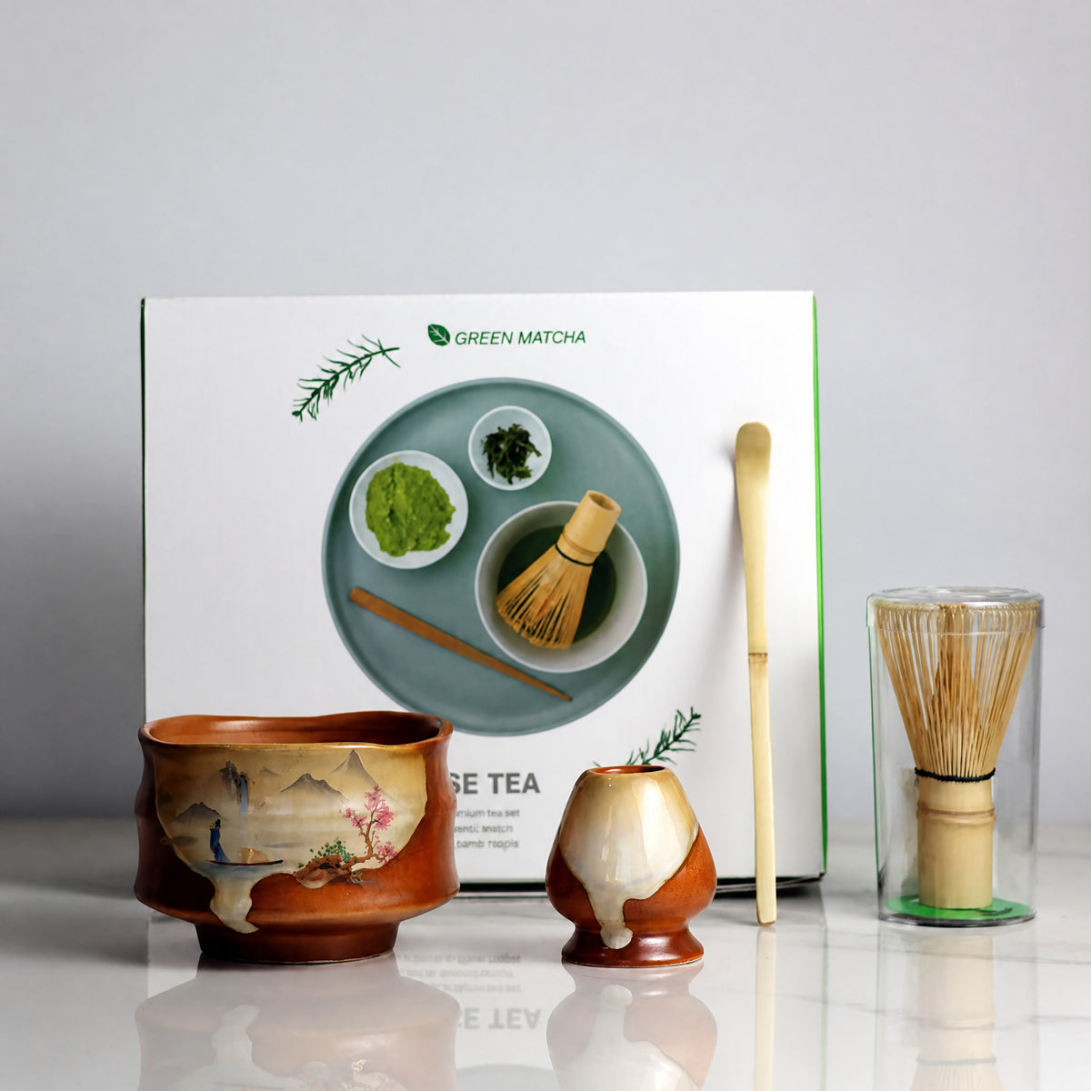Hand-painted mountain design ceramic matcha bowl with bamboo whisk